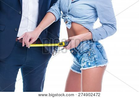 Sexy Woman Measuring Penis Size By Tape Measure, Isolated On White Background