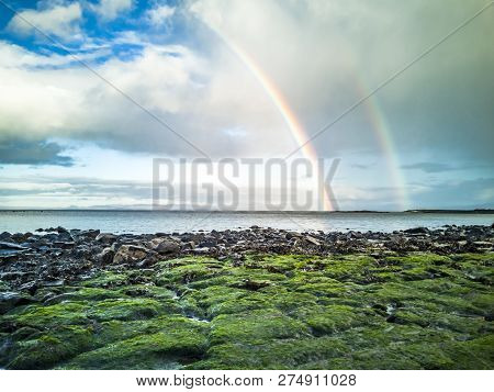 Rainbow Above The Famous Dinosaur Bay At Staffin On The Isle Of Skye