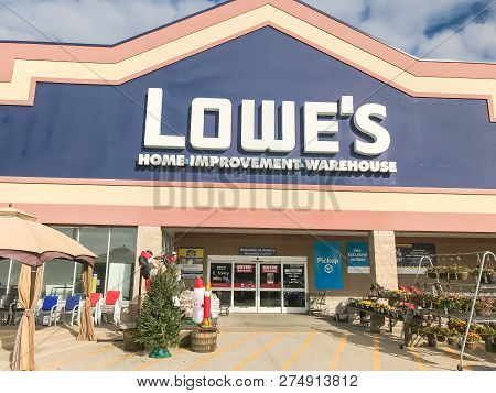 Entrance To Lowe’s Hardware Store Under Cloud Blue Sky
