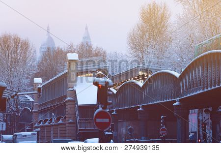 Montmartre And Sacre Coeur Over Metro Under Snow