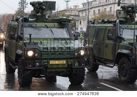 Soldiers Of Czech Army Are Riding Iveco Lmv  On Military Parade