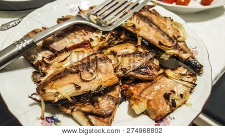 Grilled Bonito (palamut) Fish Slices At Dinner Table.
