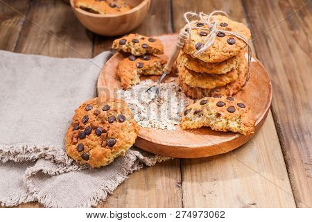 Homemade Baked Rye Flour For Breakfast. Cookies With Chocolate On A Wooden Plate. Free Space For Tex