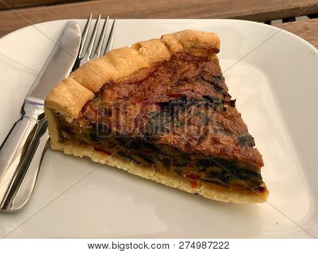 Turkish Food Quiche Tart Kis / Vegetable Pie Slice Served With Plate At Restaurant.
