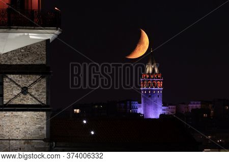 Moonset Over Galata Tower In Istanbul City, Turkey