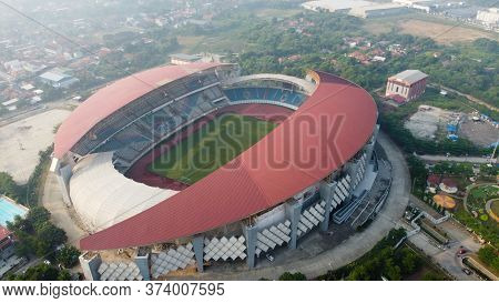 Aerial View - The Largest Stadium Of Bekasi From Drone. Indonesia. With Smog Pollution. Bekasi, Indo