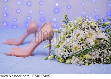 Wedding Bouquet With White Roses And Bellis.