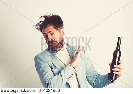 The Man Refused To Drink Alcohol And Showed A Sign Of The Stop Sign On White Background. Bearded Mal
