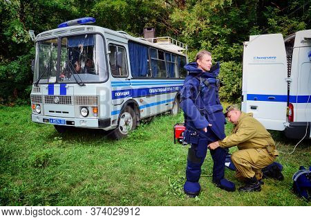 Barnaul, Russia-june 20, 2019. A Minesweeper In A Protective Suit Is Preparing To Clear A Mine Durin