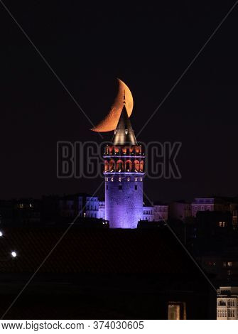 Moonset Over Galata Tower In Istanbul City, Turkey