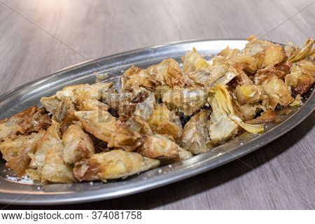 Salt Fried Artichokes On A Metal Tray