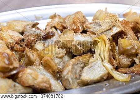 Salt Fried Artichokes On A Metal Tray