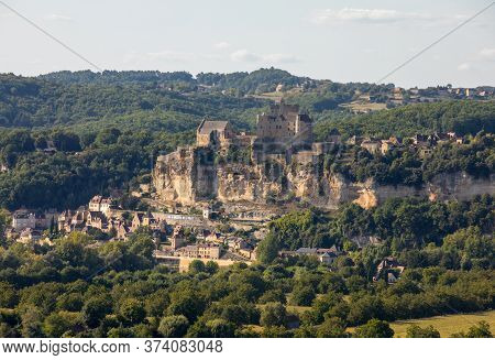 The Medieval Chateau De Beynac Rising On A Limestone Cliff Above The Dordogne River. France, Dordogn