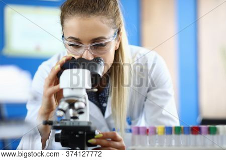 Close-up Of Laboratory Assistant Doing Analysis Of Samples. Worker Examining Dna Components In Micro
