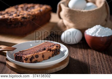 Chocolate Flavor Taiwanese Traditional Sponge Cake (taiwanese Castella Kasutera) On A Wooden Tray Ba