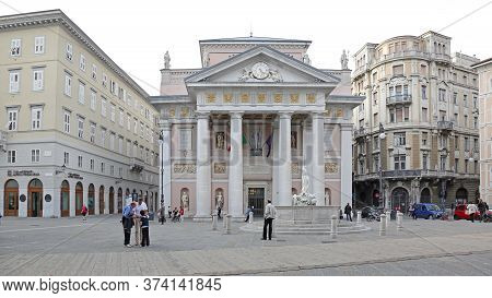 Trieste, Italy - October 13, 2014: People Walking At Piazza Della Borsa Square In Trieste, Italy.