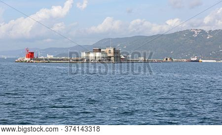 Trieste, Italy - October 14, 2014: Restaurant And Lighthouse At Breakwater Molo Foraneo Port In Trie