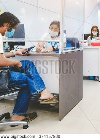 Kanchanaburi Thailand-june 20,2020: The Atmosphere Of Transactions With The Bank During The Spread O