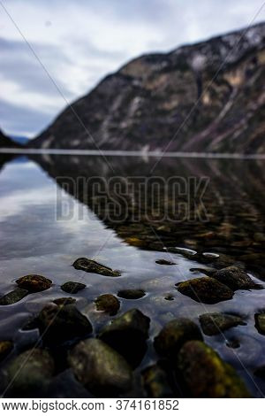 Bottom View Of The Breathtaking Northern Landscape. Fjord In Norway. Vertical Photo. Fjord On The Ba