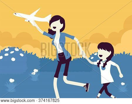 Happy Family, Mother, Daugther Playing With A Toy Airplane. Parent With Child Running Outdoor Holdin