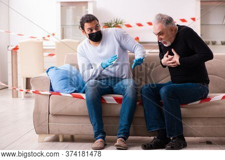 Father and son in coronavirus disease concept at home