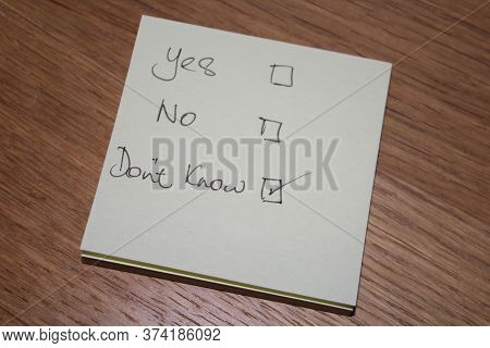Yes No Don't Know Written On Note Shows Person Has No Clue Has A Poor Understanding And Cannot Answe