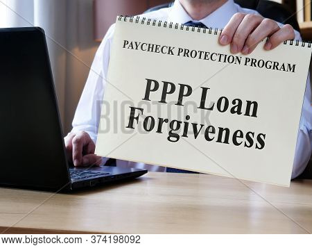 Accountant Shows Form For Ppp Loan Forgiveness.