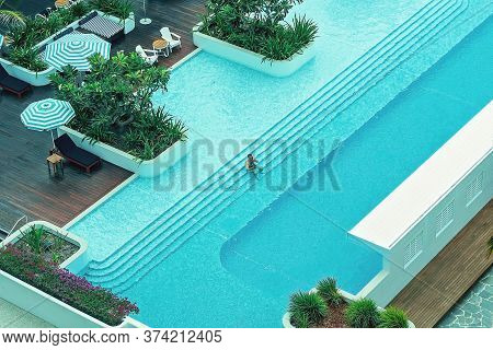 Townsville, Queensland, Australia - June 2020: Top Downl View Of Luxury Resort Hotel Swimming Pool W