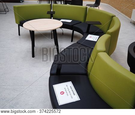 Waiting Room With Symbol On Seat For The Social Distancing During The Covid-19 Pandemic Chairs With 