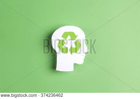 Head Profile Silhouette With Recycle Symbol On Green Background. Ecology Thinking.