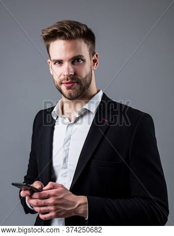 Boss Male With Mobile Phone. Sexy Ceo On Gray Background. Modern Office Life. Charismatic Business O