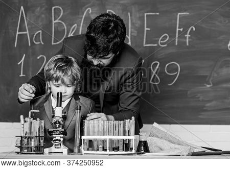 Following Father In Everything. Knowledge Day. My Father Is Scientist. Teacher Bearded Man Father An