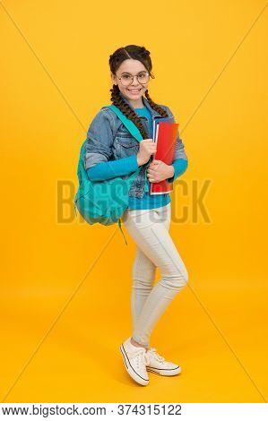 Shop For Essentials, Back To School Sale. Happy Child Back To School. Little Girl Hold Bags And Book