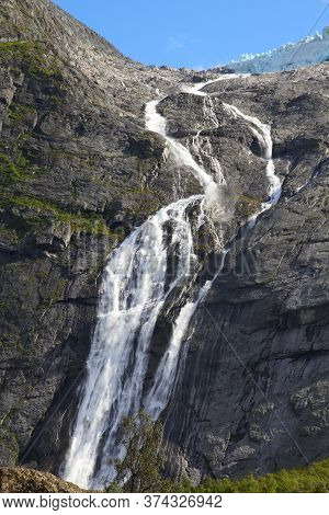 Norway Nature: Jostedalsbreen National Park. Waterfall Originating From Jostedalsbreen Glacier, Fall