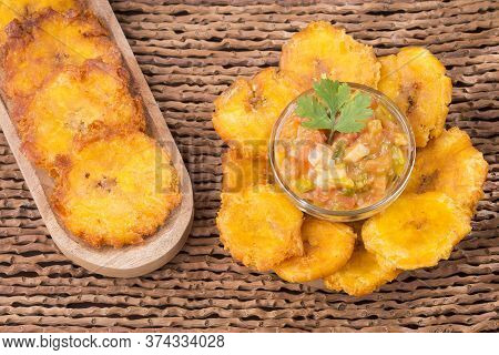 Patacón Fried Flattened Pieces Of Green Plantain (tostón, Tachino)
