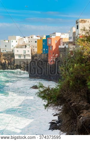 View On Colorful Buildings On The Rock Over The Ocean In Punta Brava, Puerto De La Cruz, Tenerife, C