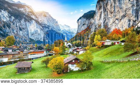 Captivating Autumn View Of Lauterbrunnen Valley With Gorgeous Staubbach Waterfall And Swiss Alps In 