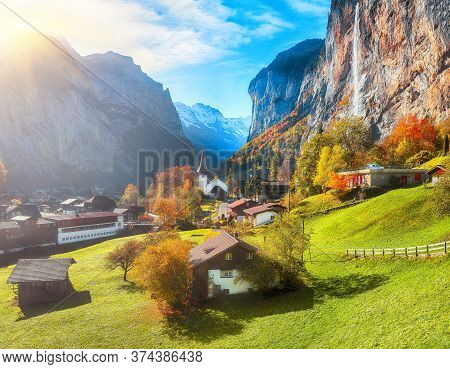 Astonishing Autumn View Of Lauterbrunnen Valley With Gorgeous Staubbach Waterfall And Swiss Alps In 