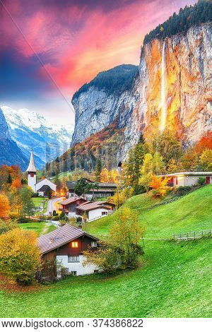 Captivating Autumn View Of Lauterbrunnen Valley With Gorgeous Staubbach Waterfall And Swiss Alps At 