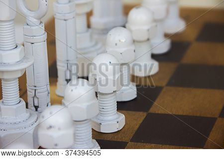 Painted White Screws, Dowels, Hooks, Clamps, Holders And Fasteners And Other Small Ironware On A Che