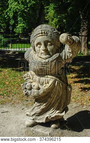 Austria, Salzburg, 09,03,2011. Statue Of A Dwarf From The Garden Of The Dwarfs Of Mirabel Park. Woma