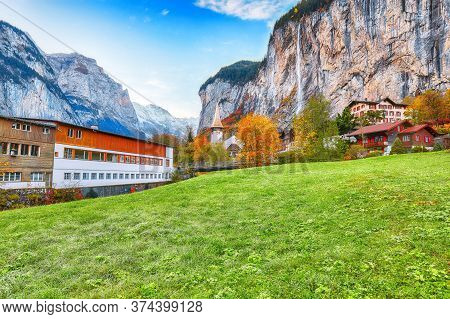 Fantastic Autumn View Of Lauterbrunnen Village With Awesome Waterfall  Staubbach  And Swiss Alps In 