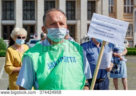 Uzhgorod, Western Ukraine - June 30, 2020: Union Workers In Protective Masks Are Protesting Against 