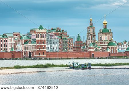 Orthodox Christian Church On The Embankment Of River At Sunset.  Kokshaga River, Yoshkar-ola Ciy, Ma
