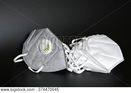 Kn95 Or N95 Mask With Valve For Protection Pm 2.5 And Corona Virus On Black Background. Prevention O