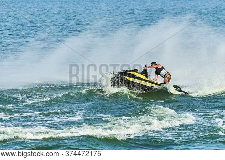 Voronezh, Russia - 23.08.2019 - Man On Water Scooter. Summer Vacation On Personal Watercraft In Trop