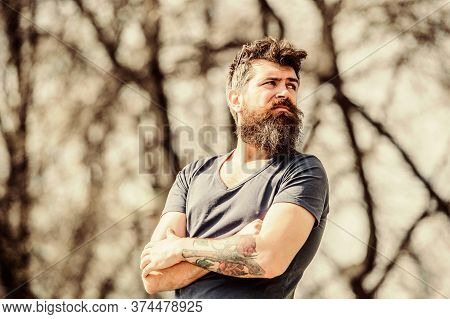 Man Attractive Bearded Hipster Posing Outdoors. Confident Posture Of Handsome Man. Guy Masculine App
