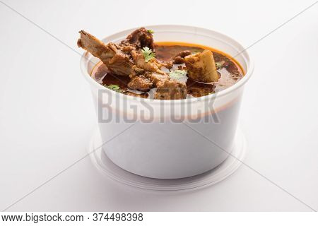 Mutton Masala Curry In Plastic Container For Home Delivery