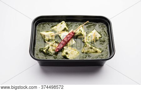 Tasty Palak Paneer Dish Ready For Home Delivery In A Plastic Box