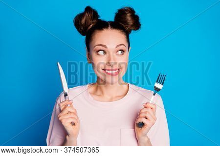Photo Of Pretty Funny Hungry Lady Two Funny Buns Hold Fork Knife Wait Tasty Meal Excited Dinner Star